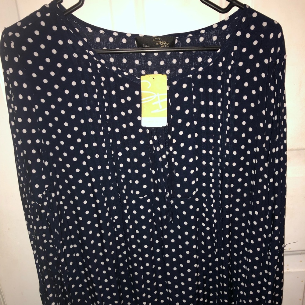 Navy blouse with white polka dots